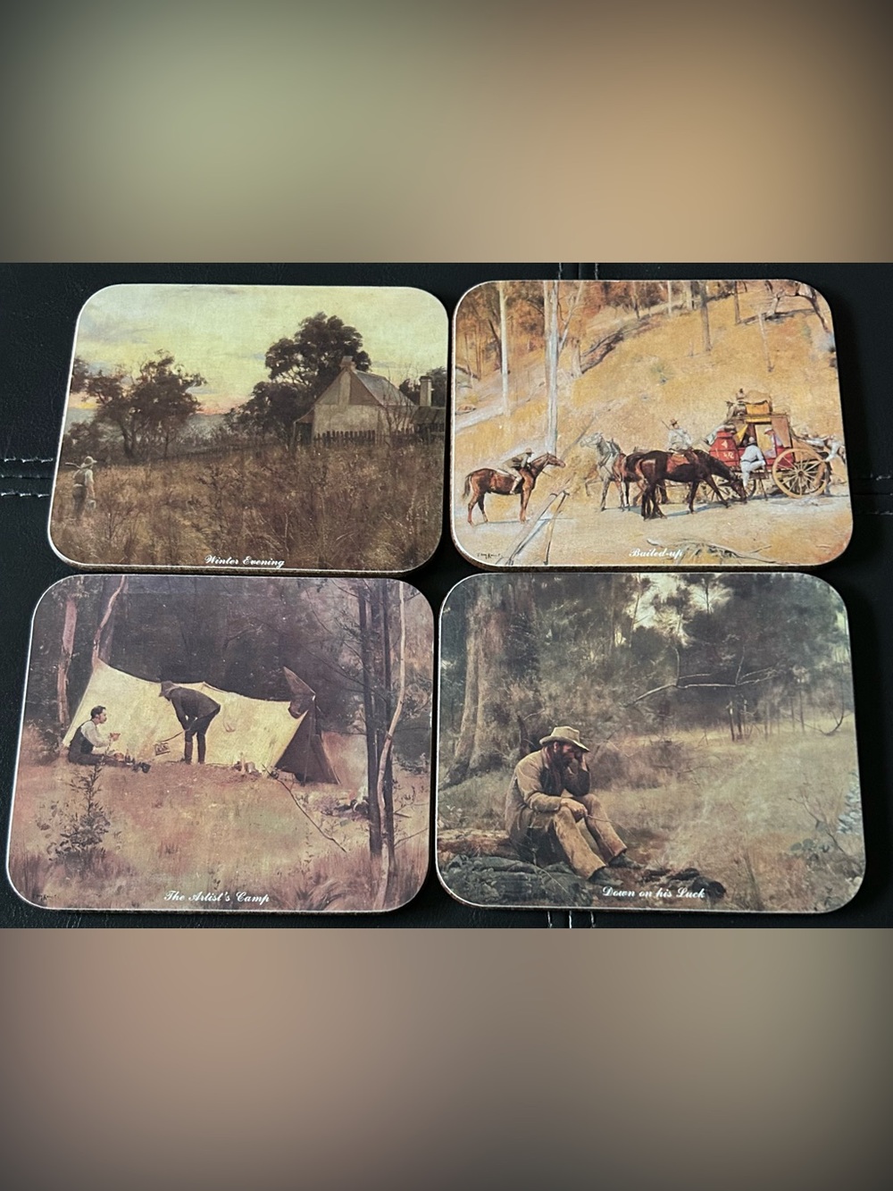 Set of vintage Jason cork-backed coasters featuring Australian frontier artwork.